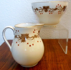 Crema de porcelana de hueso Autumn By Wedgwood England y azúcar abierta borde dorado - Imagen 1 de 10