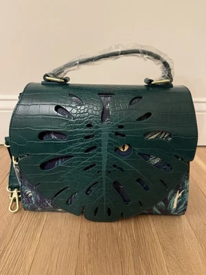 Loungefly Jurassic World Velociraptor Palm Frond Glow-in-the-Dark Crossbody Bag - Image 1 of 4