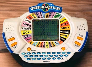 Gioco elettronico portatile vintage 1998 Tiger Wheel of Fortune con cartuccia testato anni 90 - Foto 1 di 6