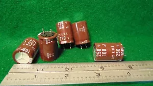 (5) Condensadores electrolíticos de plomo formado radial KMX 100uF 250 WV NUEVO DE LOTE ANTIGUO - Imagen 1 de 1