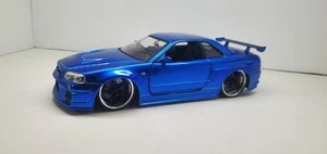 BRIAN'S NISSAN GTR SKYLINE R34 BLUE "FAST & FURIOUS" 1/24 DIECAST CAR JADA 97173 - Picture 1 of 7