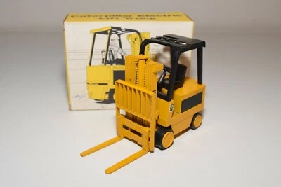 A31 1:25 NZG N.Z.G. CARRELLO ELEVATORE ELETTRICO 225 CATERPILLAR GIALLO NUOVO... - Immagine 1 di 4