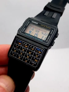 Vintage Casio Data Bank Men's Wristwatch WR 676 DBC-61, Black - Picture 1 of 3