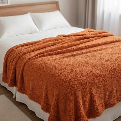 Manta de cama Bedsure naranja quemada peluda peluda de piel sintética 50" x 60" Foto 1 de 4