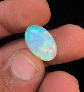 4.10 crt gorgeous blue ethiopian opal cabs with honeycomb effect and multifire - Picture 1 of 6
