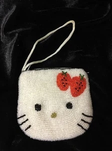 BOLSO DE MONEDAS HELLO KITTY BLANCO LENTEJUELAS ROJO ARCO CON CREMALLERA - Imagen 1 de 4