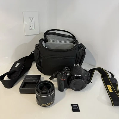 Nikon D3400 DSLR Camera Kit 18-55mm VR Lens, 128GB SD Card, Battery, Bag Bundle - Image 1 of 4