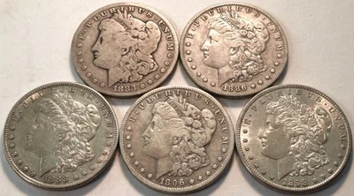 Lote (5) Dólares de Plata Morgan Better Date 1883 CC 1886 S 1888 S 1896 S 1898 S $1 Foto 1 de 4