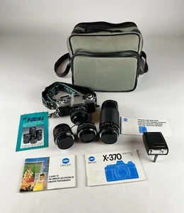 Cámara réflex Minolta X-370 35 mm de colección con estuche y cajas de transporte de múltiples lentes - Imagen 1 de 13