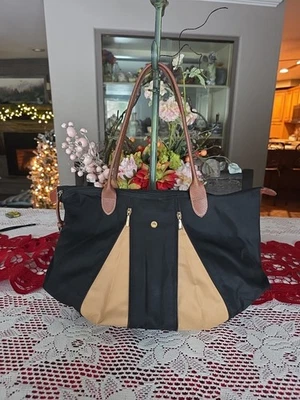 Cartera de mano Longchamp Le Pliage de nailon expandible negra y tostada  Foto 1 de 4