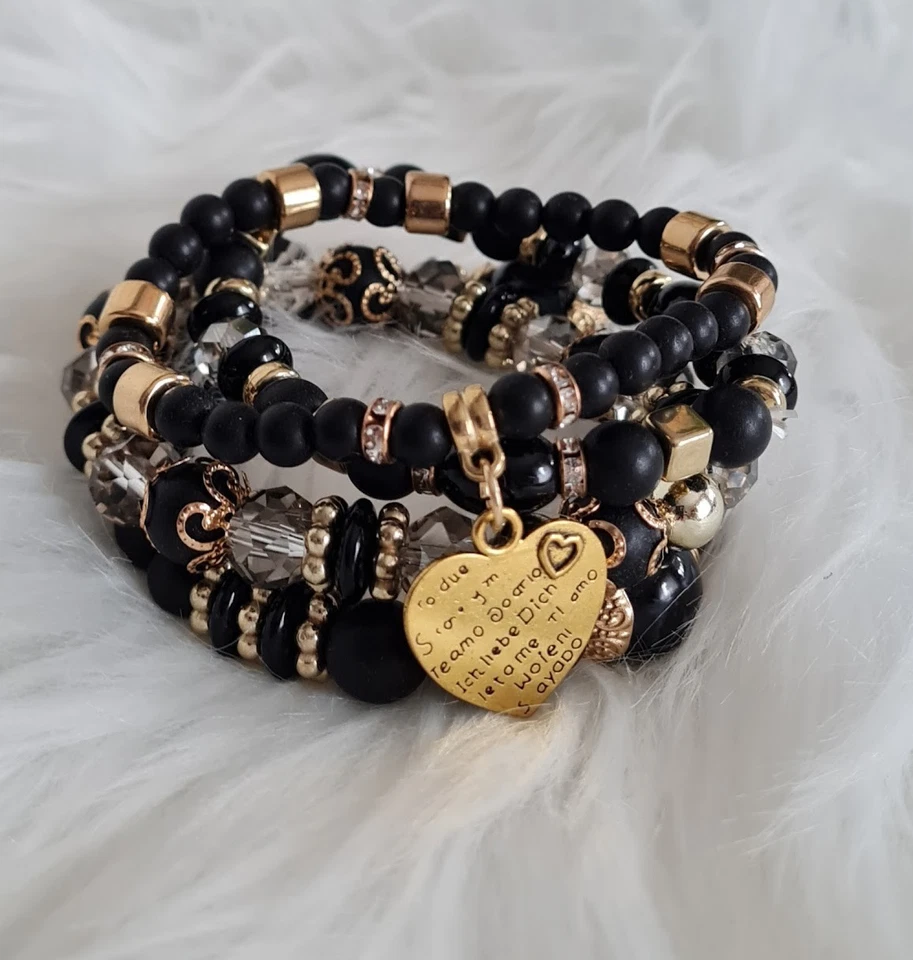 Damen Armband Set 4 Stück Schwarz Gold Perlen Herz Charm Elastisch Geschenk - Bild 1 von 4