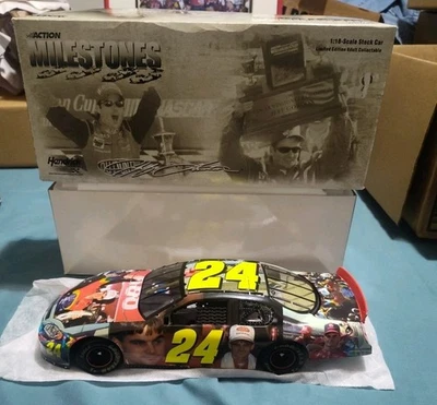 Jeff Gordon 1:18 Action Milestones Limited Edition Charlotte Win Diecast Car - Image 1 of 4