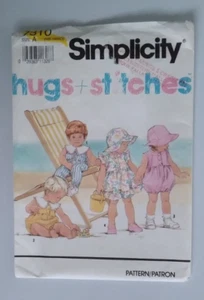 SIMPLICITY #7310 GIRLS SIZES NB - 18MOS DRESS ROMPER & HAT PATTERN UNCUT - Picture 1 of 4