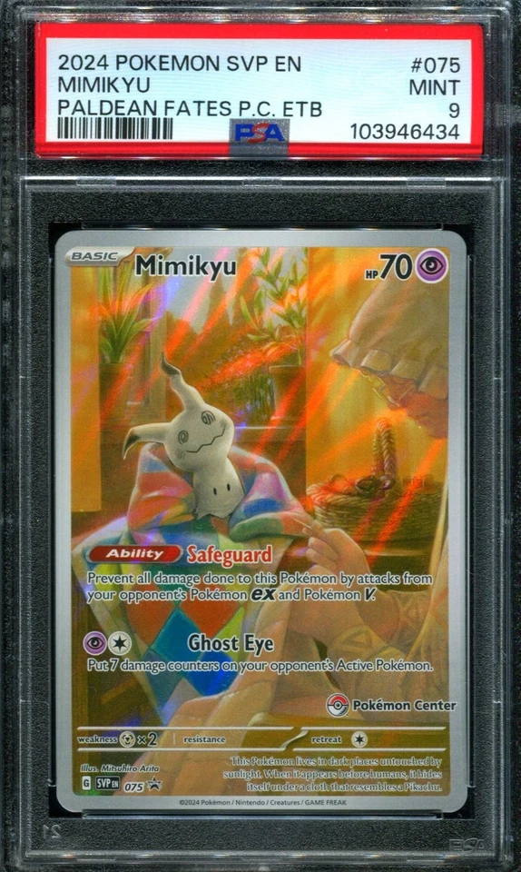 PSA 9 Mimikyu SVP 075 Paldean Fates ETB POKEMON CENTER EXCLUSIVE Promo Card - Image 1 of 1