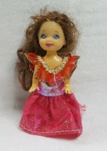 POUPÉE BÉBÉ SANS MARQUE BRUNE AVEC LES YEUX BLEU ET ROBE DE PRINCESSE VIOLET - Imagen 1 de 3