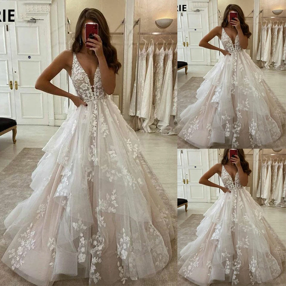 Beach Wedding Dresses A Line V-Neck Backless Ruffles Lace Appliques Bridal Gowns - Image 1 of 4