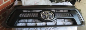 Radiator Grille Assembly Toyota Tacoma 2012-2015 53100-04471 New Old Stock Grey - Picture 1 of 17
