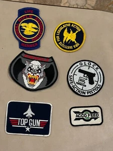 6 verschiedene Aufnäher, NRAx2, Glock, Top Gun, Airwolf, & Acco Feed - Bild 1 von 3
