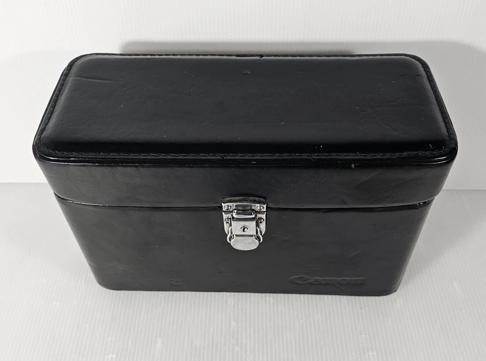 Estuche rígido de almacenamiento para cámara Canon negro, interior rojo, vintage Foto 1 de 4