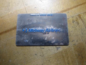 PLACA DE VALIDACIÓN DE BILLETES DE AVIÓN ANTIGUOS DE MIDWAY AIRLINES AGENCIA DE VIAJES PROPIEDAD DE - Imagen 1 de 4
