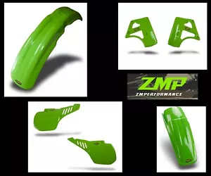 NEW KAWASAKI KX250 KX500 1986 GREEN FRONT AND REAR FENDERS SIDE PANELS SCOOPS - Picture 1 of 1