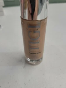 Base líquida satinada Tigi beige mediana - Imagen 1 de 1