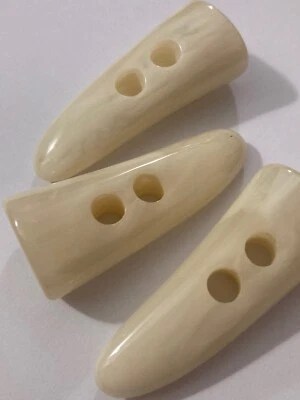 Duffle Coat Toggles Ivory 48.5mm (4.85cm) Pack Sizes Horn Effect Streaks - Image 1 of 4
