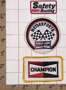 CHAMPION MOTORSPORT ZÜNDKERZEN SICHERHEIT RENNWAPPEN EMBLEM AUFNÄHER SET - Bild 1 von 1
