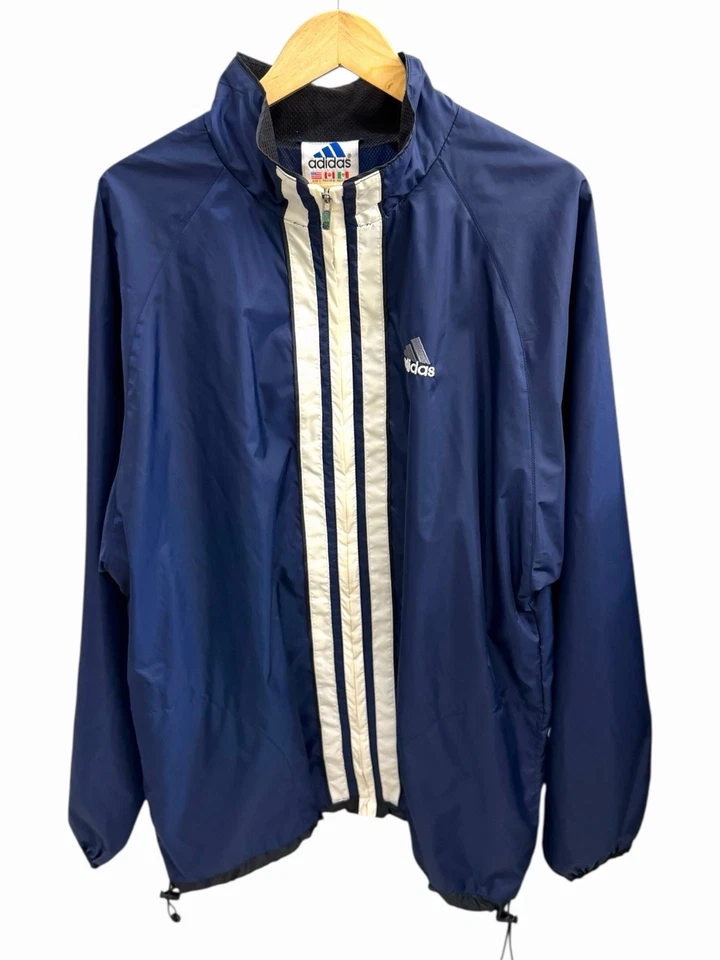 Chaqueta cortavientos vintage Adidas años 90 nailon 3 rayas golpe central - grande Foto 1 de 4
