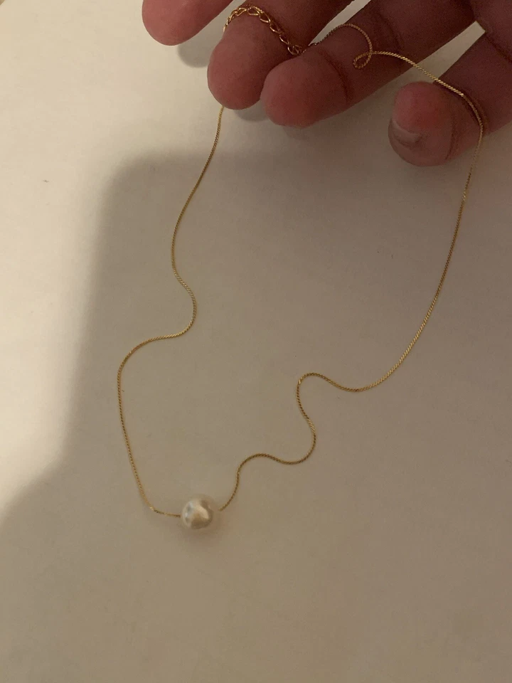 Collar de perlas de oro Foto 1 de 1