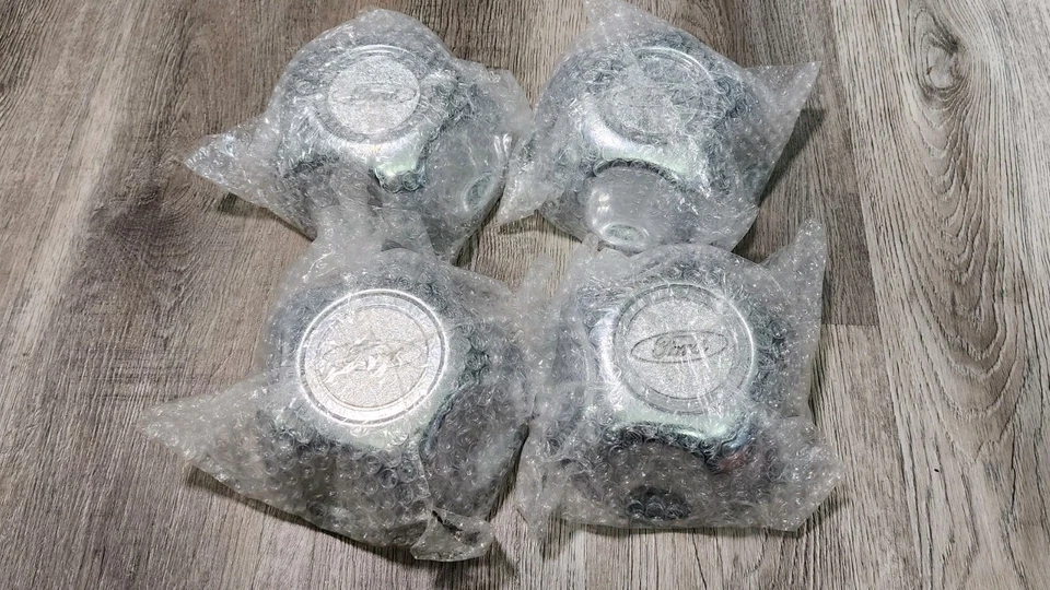 OEM 1995 to 2000 Ford Explorer alloy wheel center caps hubcaps F57A-1A096-AC Foto 1 de 3