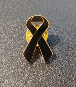 Black Ribbon Melanoma/Skin Cancer Enamel Gold Tone Trimmed Lapel Pins Hat Pins - Picture 1 of 2