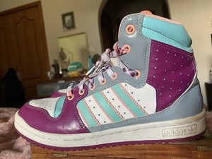 pink and white high top adidas