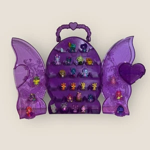 Vitrina Hatchimals Colleggtibles púrpura brillo con mini figuras - Imagen 1 de 8