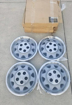 Jeep Cherokee AMC Eagle 1984-1989 tapacubos tapacubos juego de 4 nuevo de stock  Foto 1 de 4