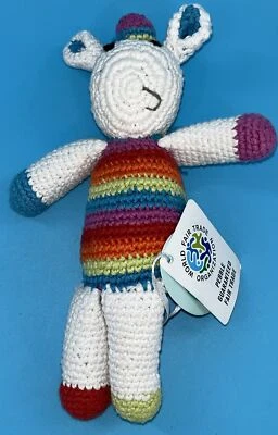 Sonajero unicornio arco iris tejido comercio justo marca Pebble TOTALMENTE NUEVO Foto 1 de 4