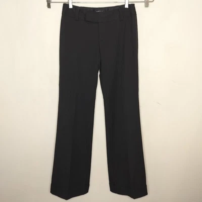 Pantalones acampanados de tiro bajo negros Nanette Lepore de colección talla 4 con puños tiro bajo hechos en EE. UU. Foto 1 de 4