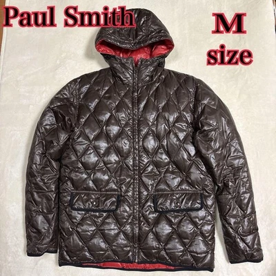 Chaqueta de plumón acolchada reversible Paul Smith marrón rojo cálido polar Foto 1 de 4