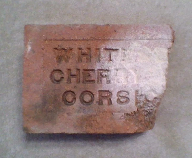 Medio/trozo de ladrillo de arcilla roja vintage Whiteselle Cherry Reds Corsicana  Foto 1 de 1