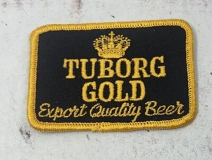 Tuborg Gold Export Qualität Bier Werbung Aufnäher gold schwarz bestickt - Bild 1 von 3