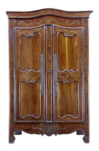 18TH CENTURY CARVED FRENCH YEW WOOD AND CHESTNUT ARMOIRE