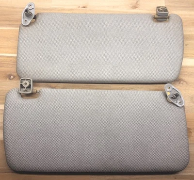 Nissan Pathfinder 1987-1995 carrocería rígida D21 camioneta conductor pasajero parasoles OEM Foto 1 de 4