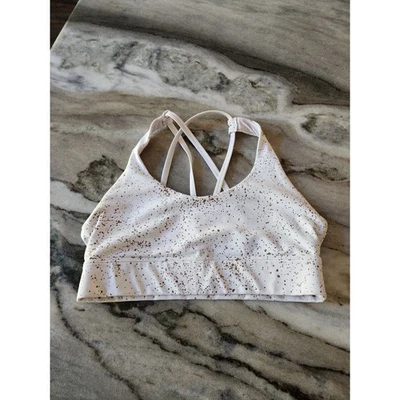 Sujetador deportivo ZYIA blanco Stay dorado claro y apretado con tiras mediano - sin almohadillas Foto 1 de 4