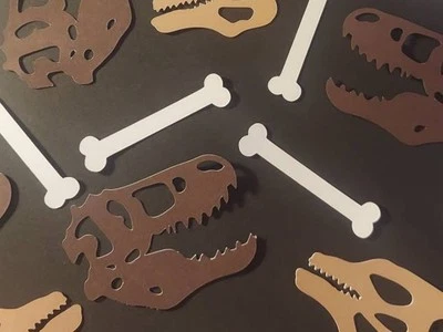 Papel dinosaurio confeti marrón beige blanco Foto 1 de 3