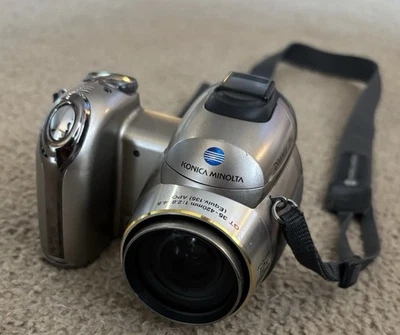 Konica Minolta Dimage Z6 6.0MP Digital Camera Silver Tested Working With Strap - Image 1 of 4