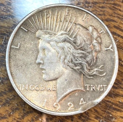 1924 Peace Dollar Nice Original Gold-Toned Unc. w/Rim Clip Error CHRC - Image 1 of 3