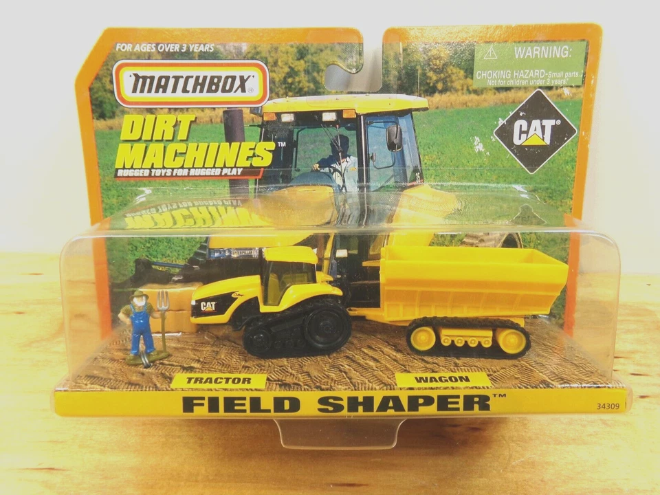Matchbox 1998 Dirt Machines 34309 Field Shaper CAT Tractor and Wagon - Image 1 of 4