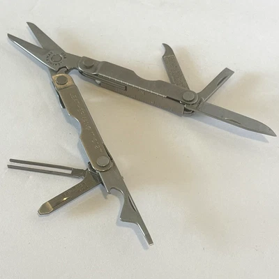 Leatherman брелок Micra 10-в-1 мульти инструмент общего назначения ножницы и многое другое VGC - Изображение 1 из 4