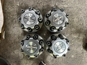 OS53 -1999-2010 CHEVY SILVERADO 8 LUG NUT CENTER CAP x4 ALL 32 LUG NUTS 15006332 - Picture 1 of 2