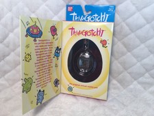 1997 Bandai Original Tamagotchi Clear Black With Silver Buttons & Lettering NEW
